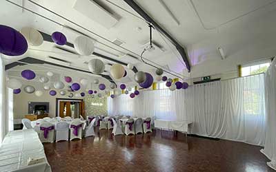 The Hall Beautifully Decorated For A Wedding.
