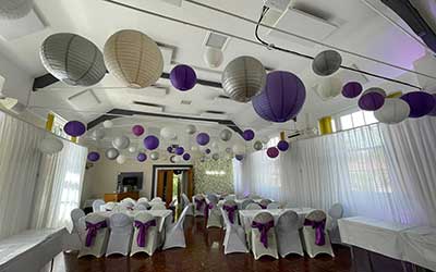 The Hall Beautifully Decorated For A Wedding.