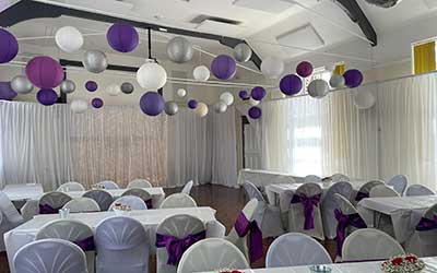 The Hall Beautifully Decorated For A Wedding.